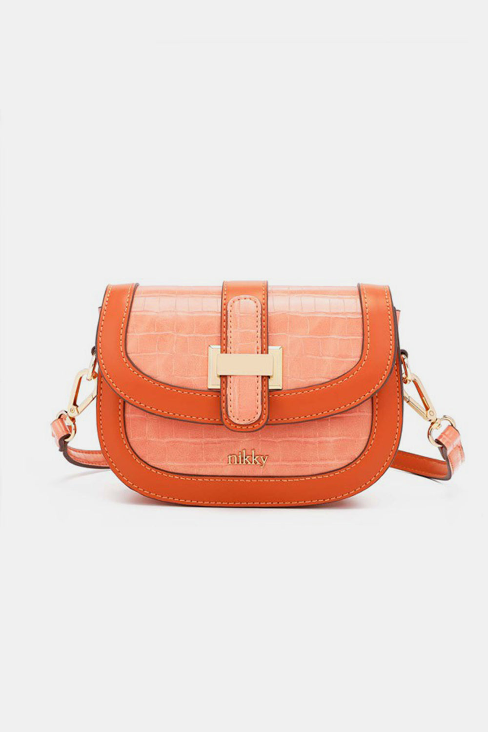 This stylish Nicole Lee USA croc embossed crossbody bag, crafted from eco-leather, features an orange hue, a gold buckle, and the brand name "nikky" on the front.