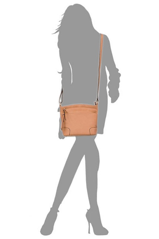 The Fashion Multi Zip Pocket Crossbody Bag is a beige faux leather handbag featuring gold hardware, a front zipper pocket, a two-tone adjustable shoulder strap, and two tassels.