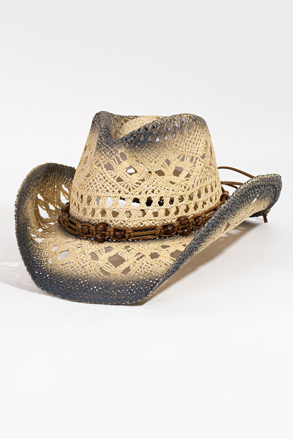 The Fame Cutout Rope Strap Wide Brim Hat is an ideal choice for summer outings, featuring a woven straw design with a dark, textured brim and a decorative band around the crown. Its stylish cutout rope strap adds an extra touch of flair.