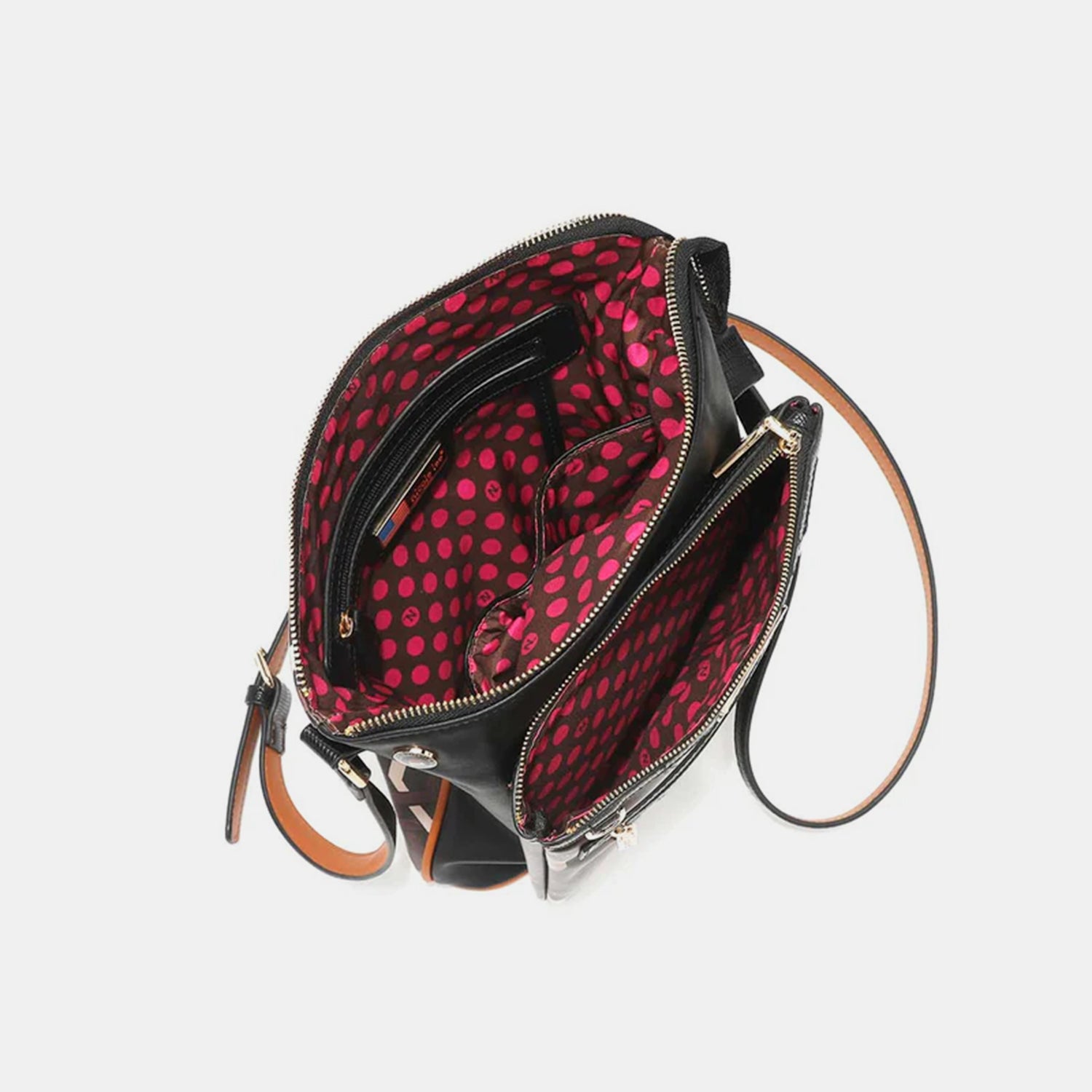 The Nicole Lee USA Geometric Pattern Crossbody Bag is a chic accessory made from vegan leather, featuring a striking geometric design, multiple front zipper pockets, and elegant gold-tone hardware.