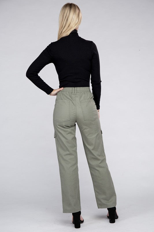 A person is wearing high-waisted, olive green Everyday Wear Elastic-Waist Cargo Pants, complemented by black high-heeled sandals.