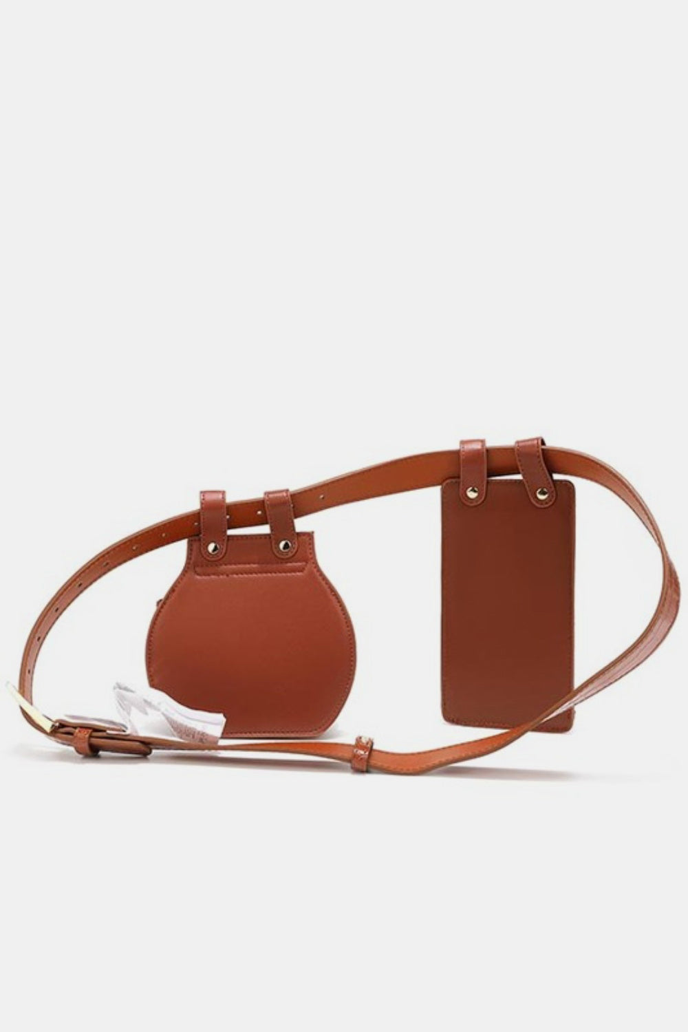 The Nicole Lee USA 2 Piece Texture Belt Bag is a brown vegan leather belt with an attached phone case and small pouch featuring a crocodile skin pattern. The adjustable belt also includes removable pouches for added convenience and style.