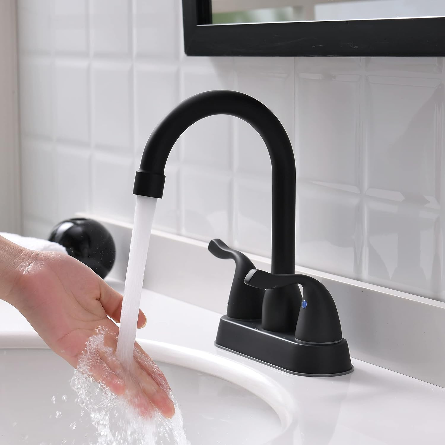 2 Handle Black Bathroom Sink Faucet - 4 Inch Centerset Faucet Bathroom 2 or 3 Hole Lavatory Faucet Bathroom Vanity Sink Faucets with Pop-up Drain and Supply Lines Matte Black installed on a white sink.