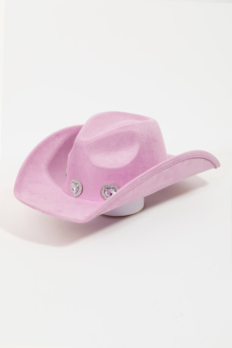 The Fame Rhinestone Pave Heart Cowboy Hat, a vibrant pink accessory made from durable polyester alloy, features three decorative silver embellishments on the front. It is showcased against a plain white background and includes an adjustable string to ensure a perfect fit for any head size.