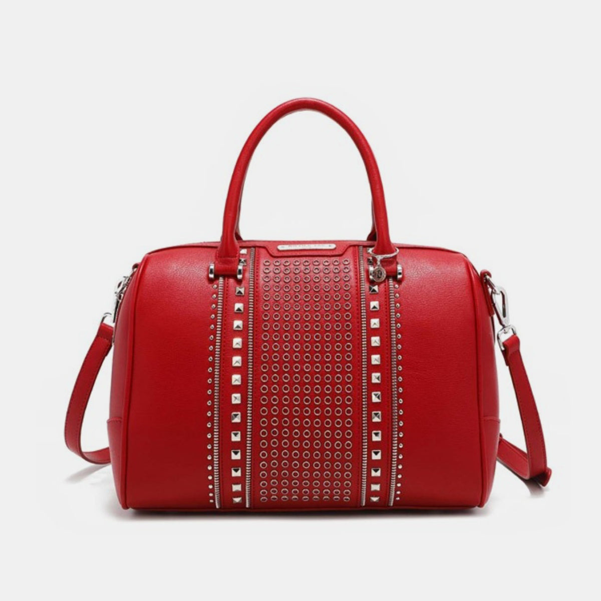 Nicole Lee USA Studded Boston Bag, crafted from luxurious vegan leather in red, showcases a design with two handles and metallic stud and ring embellishments on the front.