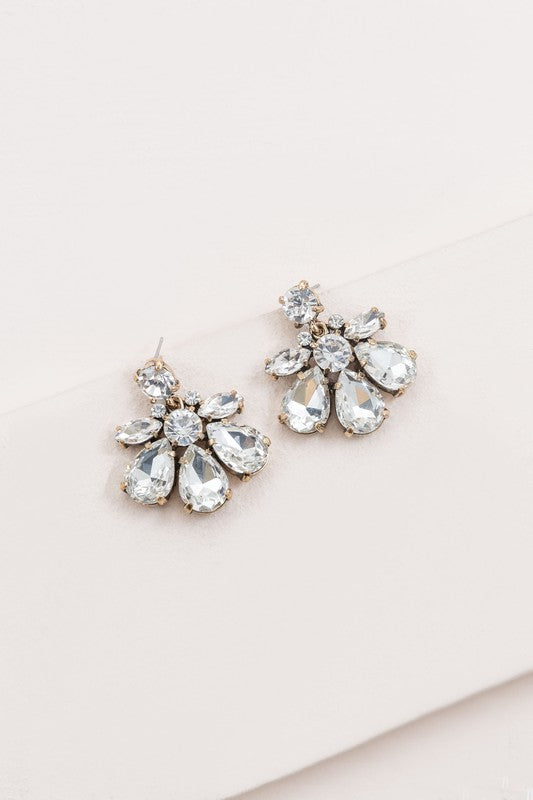 A pair of Water Lily Stone Earrings with iridescent green stones against a white background.