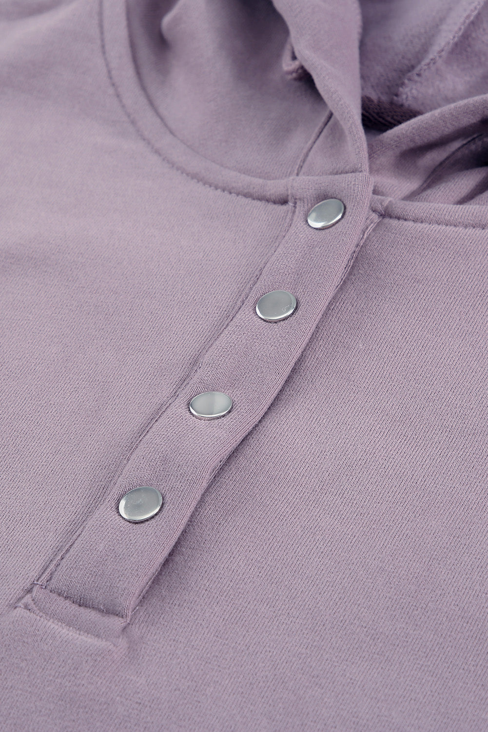 Back view of a person wearing a Purple Snap Button Pullover Hoodie with Pocket and light blue denim shorts with frayed hems, perfect for casual occasions, standing against a grey textured background.