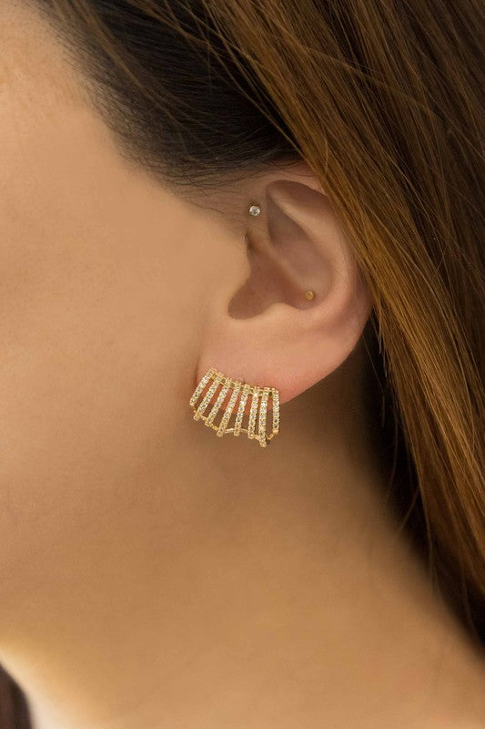 Armored Curved Huggie Hoop Earrings with embedded rhinestones on a white background.