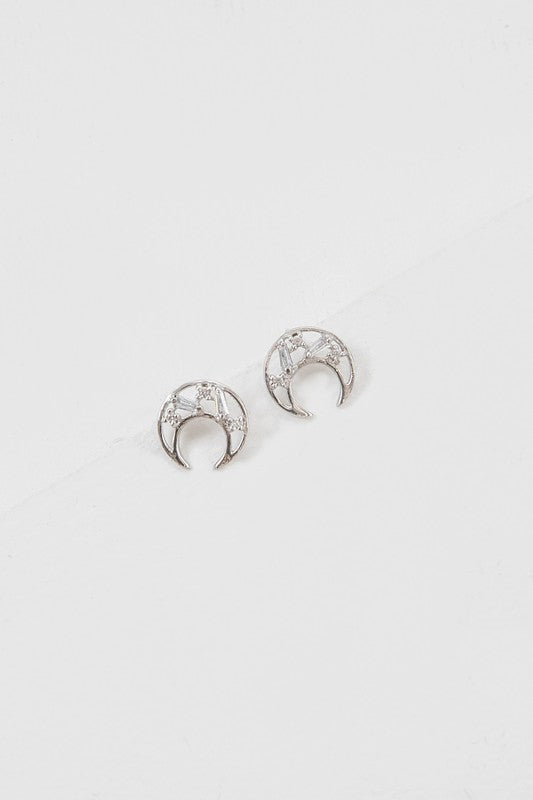 Pair of small Crescent Stone Earrings on a white surface.