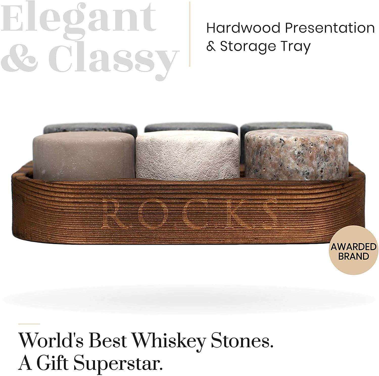 A set of The Original ROCKS Whiskey Chilling Stones - Set of 6 Granite Stones in a wooden box by Apricot Pontus.