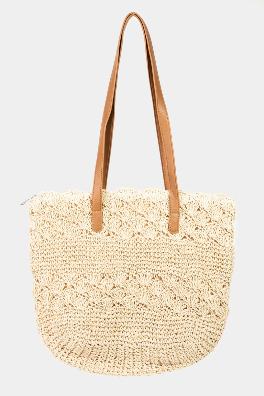 The Fame Straw Braided Tote Bag, featuring beige leather handles and a textured pattern, exudes rustic elegance and is the perfect summery accessory.