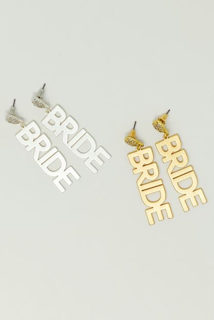 A pair of Say I Do Bride earrings in silver on the left and a pair of Say I Do Bride earrings in gold plated on the right against a light background, perfect for bachelorette party accessories.