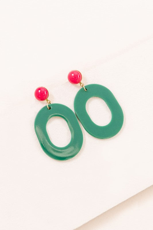 Party All Day Earrings with red studs on a white background.