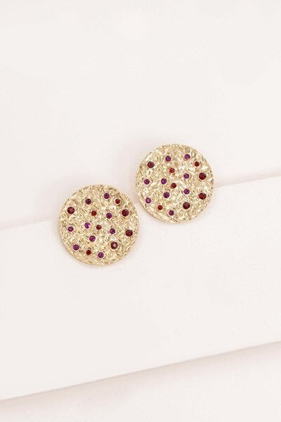 Wishing Well Plate Earrings with blue gemstone embellishments.