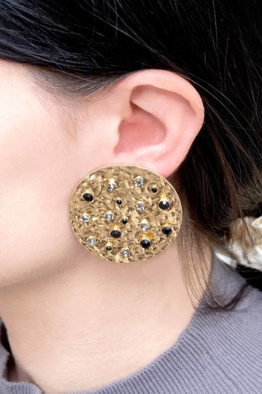 Wishing Well Plate Earrings with blue gemstone embellishments.