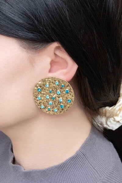 Wishing Well Plate Earrings with blue gemstone embellishments.