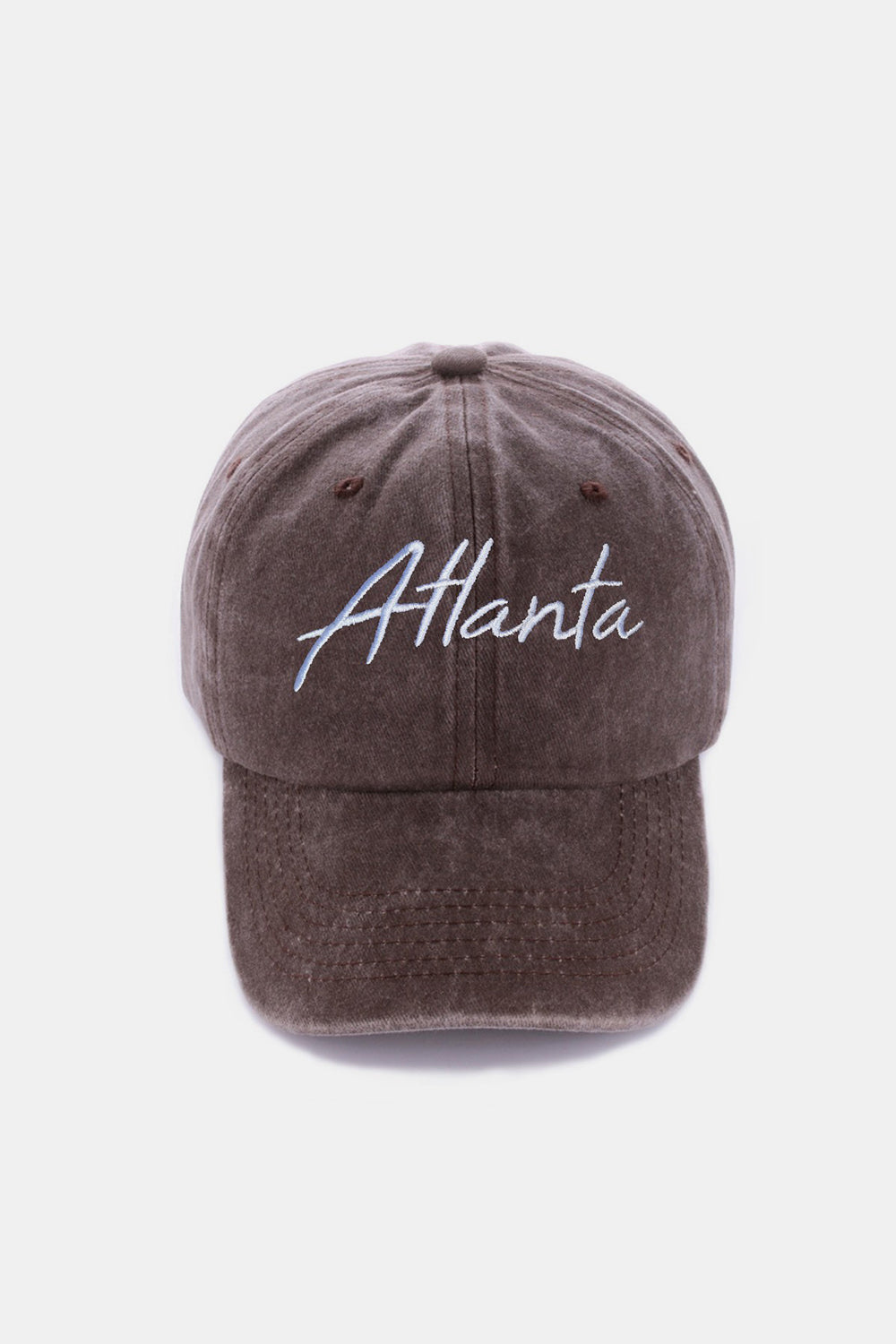 The Zenana Washed ATLANTA Embroidered Baseball Cap is a vintage style accessory, showcasing the word "Atlanta" embroidered in white on its blue denim front.