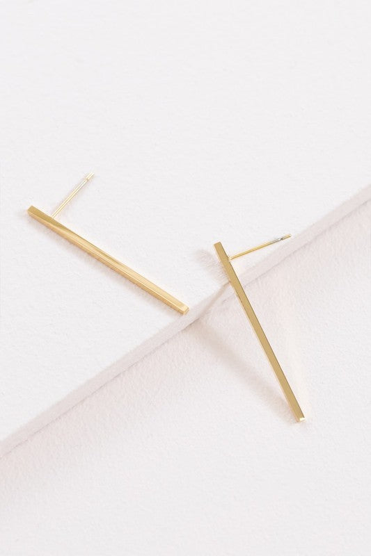 Boss Status Bar Earrings on a white textured surface.