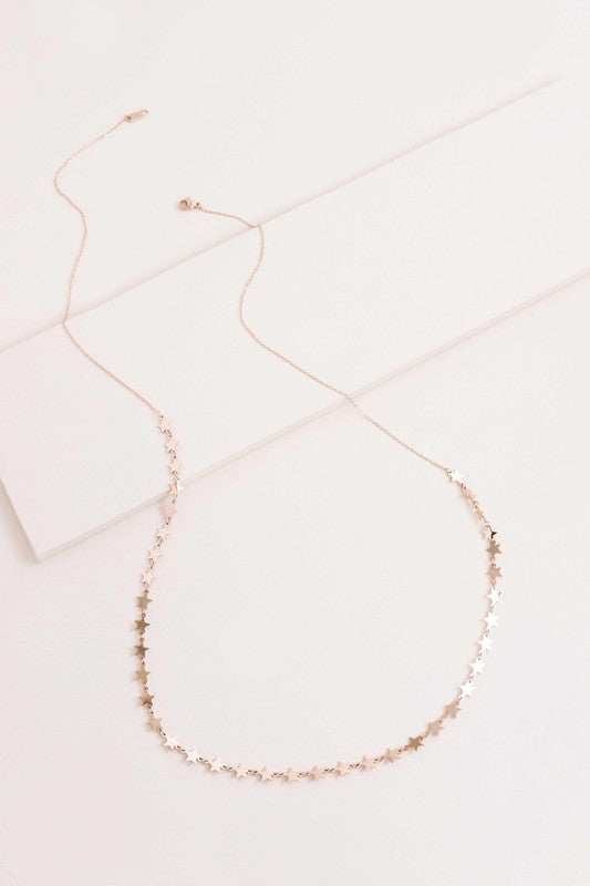 A delicate All The Stars Necklace in 14K gold displayed on a white background.