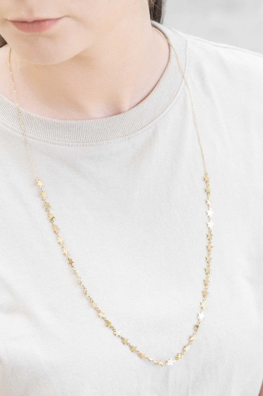 A delicate All The Stars Necklace in 14K gold displayed on a white background.