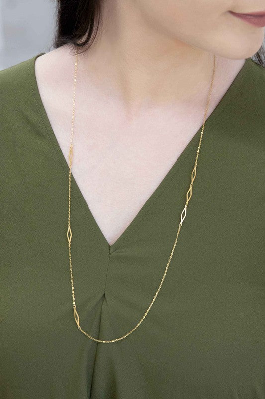 A delicate Diamonds Are Forever Necklace displayed on a white surface.