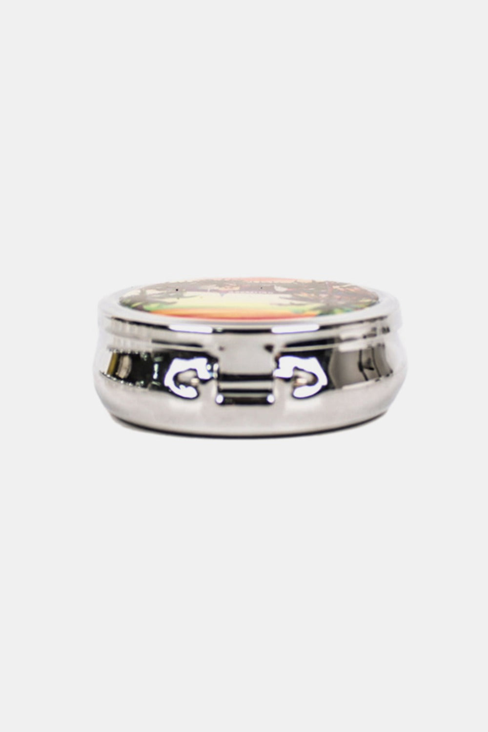 The Nicole Lee USA Print Metallic Circular Small Pill Case holds a metal pin that showcases an illustration of a dog and cat driving a red convertible through a city adorned with iconic buildings and landmarks, all wrapped in a sleek silver-tone metal exterior.