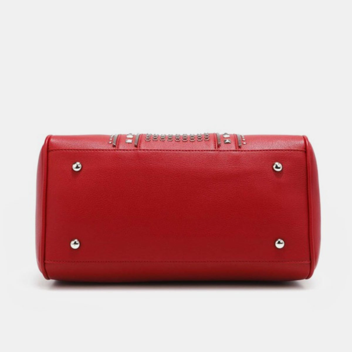 Nicole Lee USA Studded Boston Bag, crafted from luxurious vegan leather in red, showcases a design with two handles and metallic stud and ring embellishments on the front.