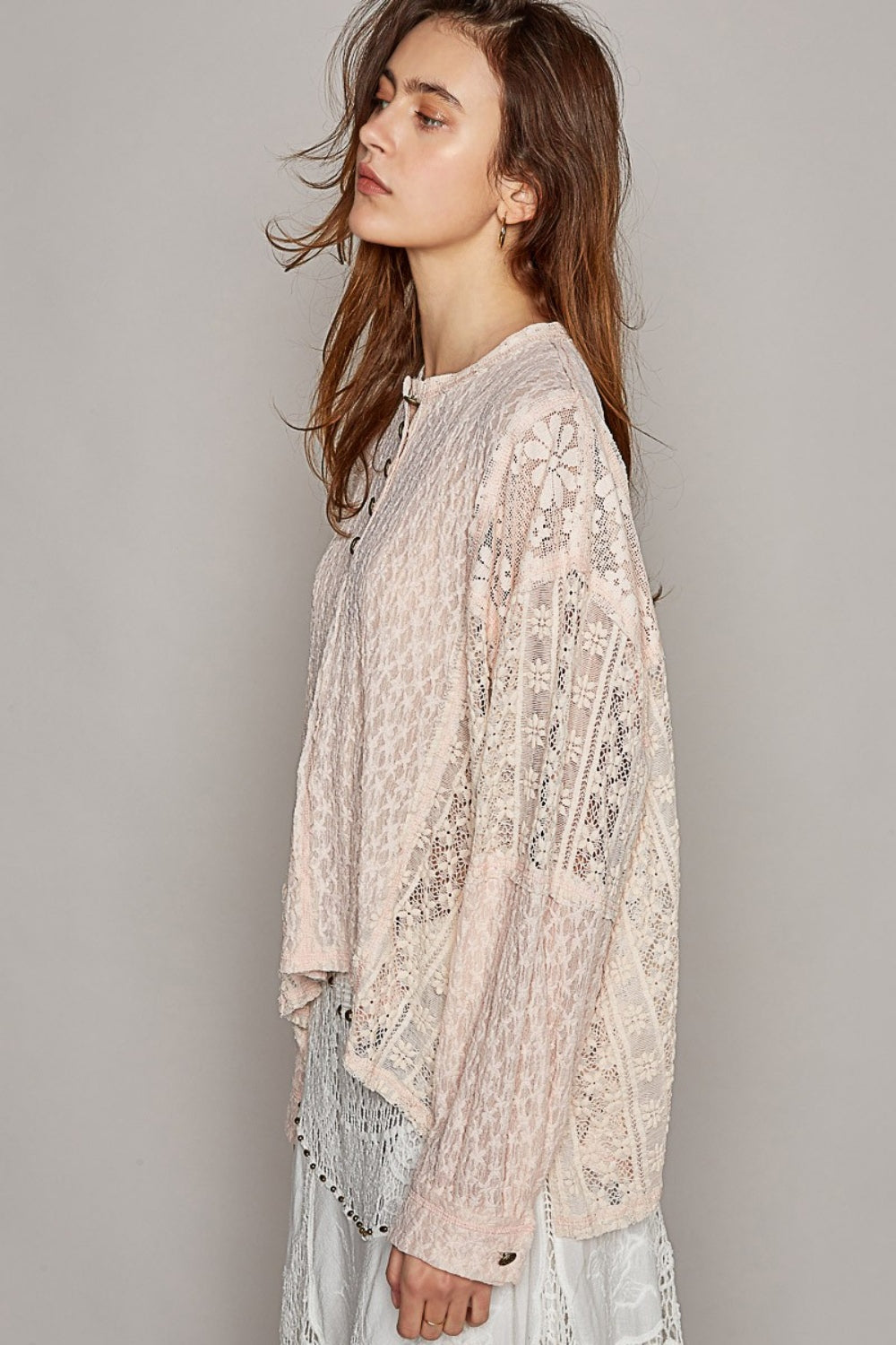 A person with long hair wearing the POL Round Neck Long Sleeve Raw Edge Lace Top and a matching white lace skirt poses against a plain background.