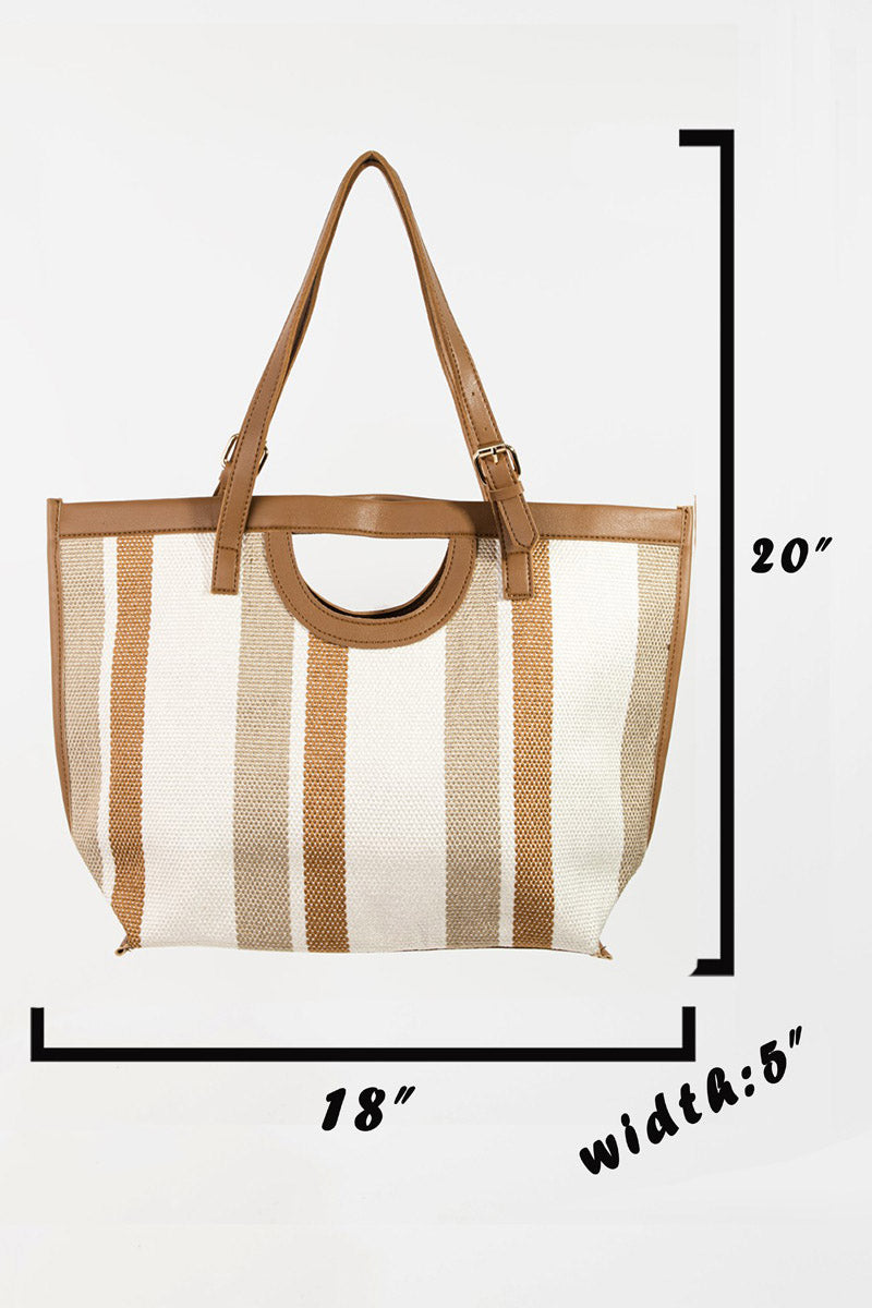 The Fame Striped PU Leather Trim Tote Bag, showcasing beige and brown stripes with leather handles and an adjustable strap, is the ideal fashionable accessory to complement any outfit.