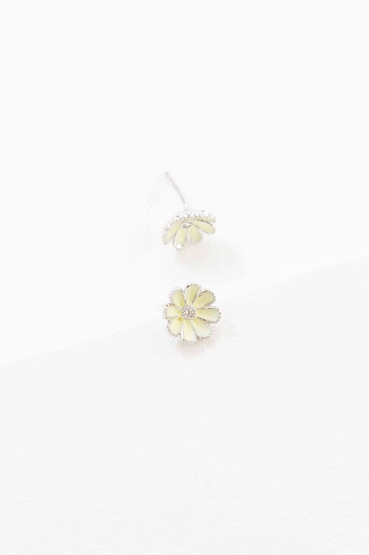 A pair of Primrose Stud Earrings on a white background.