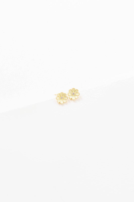 A pair of Primrose Stud Earrings on a white background.