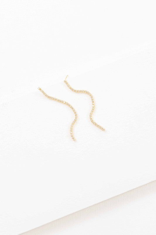 A pair of Airs and Graces sterling silver dangle earrings on a white background.