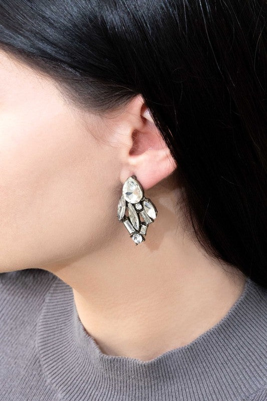 Pair of Melody Cluster Drop Earrings on a white background.