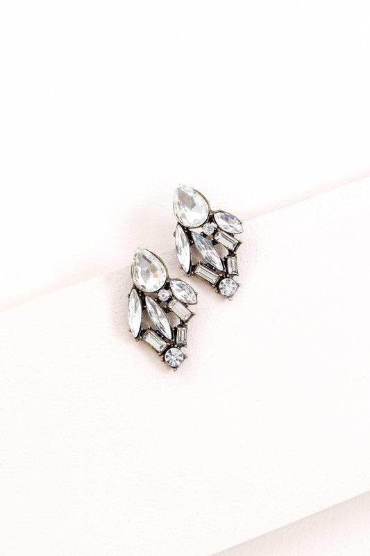 Pair of Melody Cluster Drop Earrings on a white background.