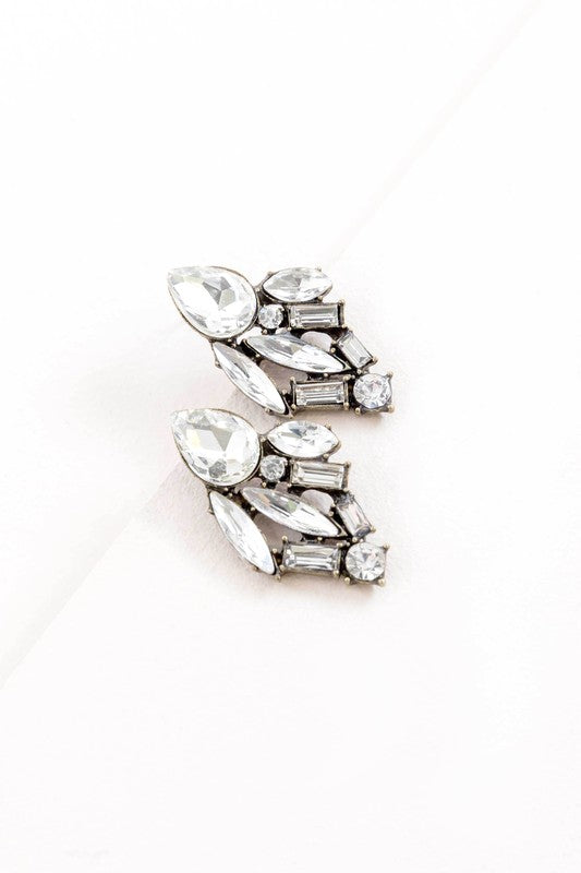 Pair of Melody Cluster Drop Earrings on a white background.