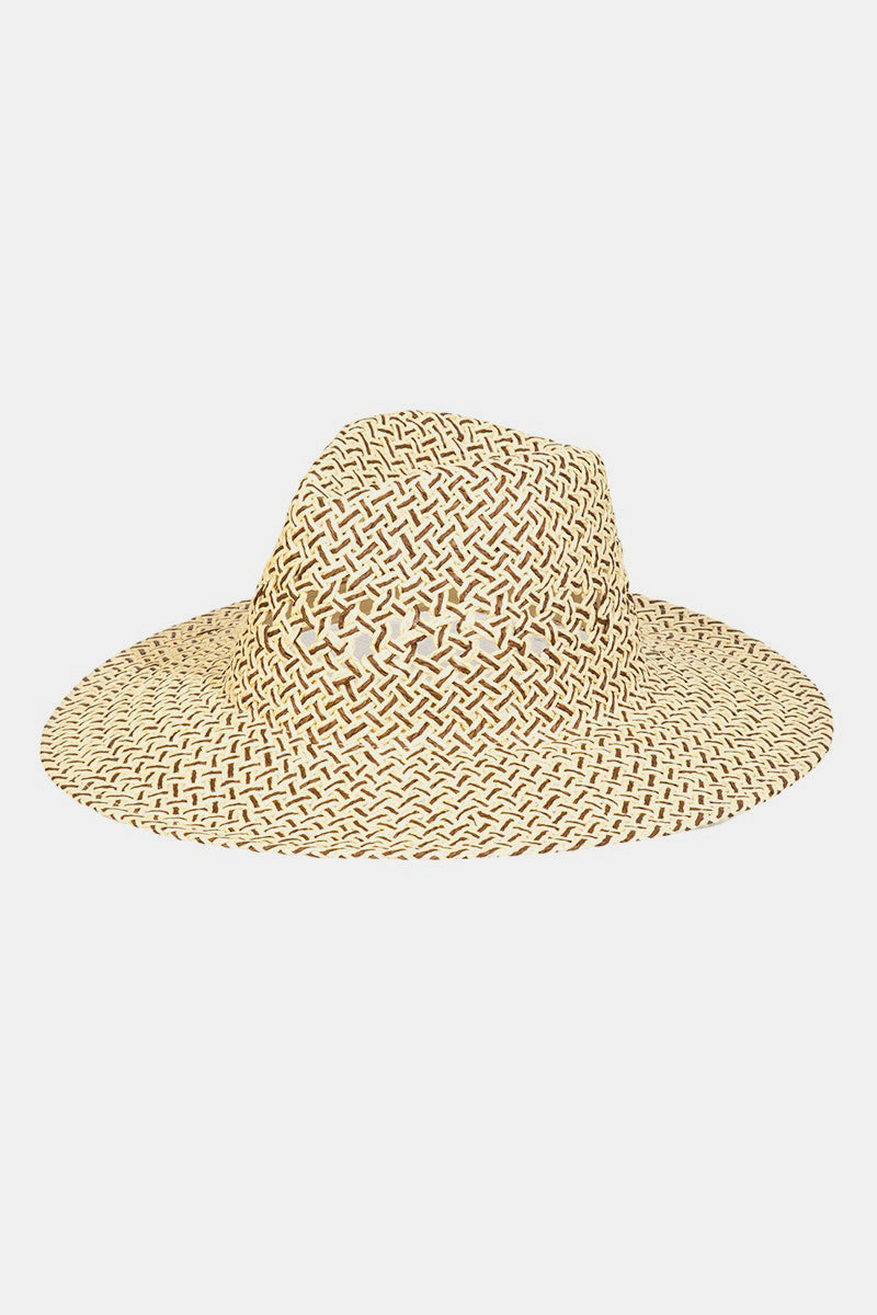 The Fame Cutout Woven Straw Hat provides outstanding sun protection with its wide brim, and the textured pattern enhances the elegance of this fashionable accessory.