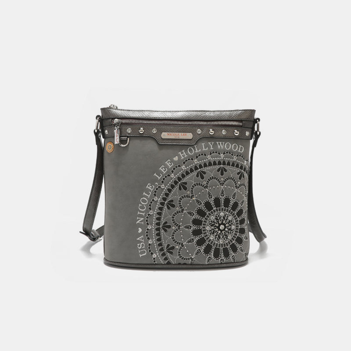 The Nicole Lee USA Metallic Stitching Embroidery Inlaid Rhinestone Crossbody Bag is a brown vegan leather accessory adorned with intricate white designs and text reading "Nicole Lee Hollywood USA" on the front. It features diamond rhinestones, multiple zippered compartments, and an adjustable strap.