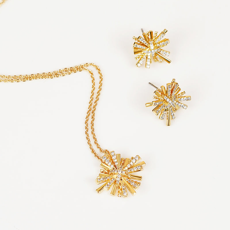 A breathtaking Starburst Gold-Plated Earrings and Necklace Set adorned with shimmering zircon accents.