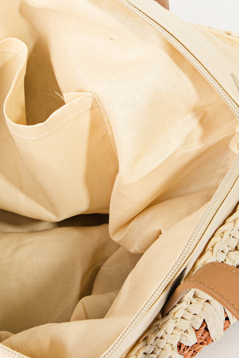 A Fame Straw Braided Striped Tote Bag featuring tan handles and a checkered pattern in cream, brown, and terracotta colors.