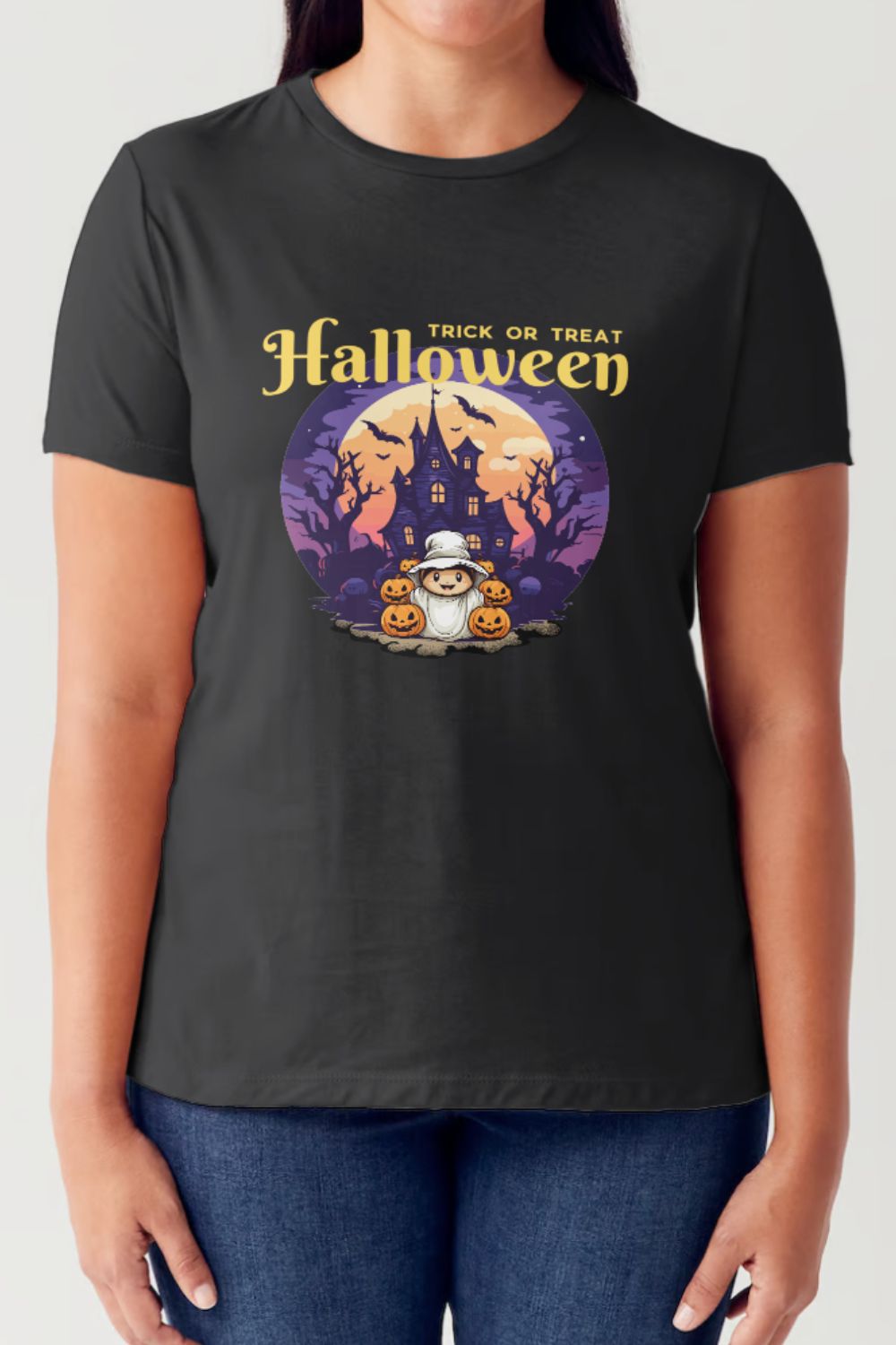 A person wearing the Simply Love Full Size "TRICK OR TREAT" Short Sleeve Tubular T-Shirt, which features a festive black design with a haunted house, bats, orange pumpkins, and the text "TRICK OR TREAT Halloween," perfectly capturing the Halloween spirit.