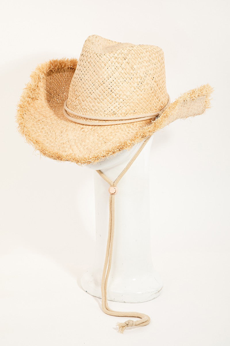 The Fame Adjustable Strap Raw Hem Weave Hat is displayed on a white stand.