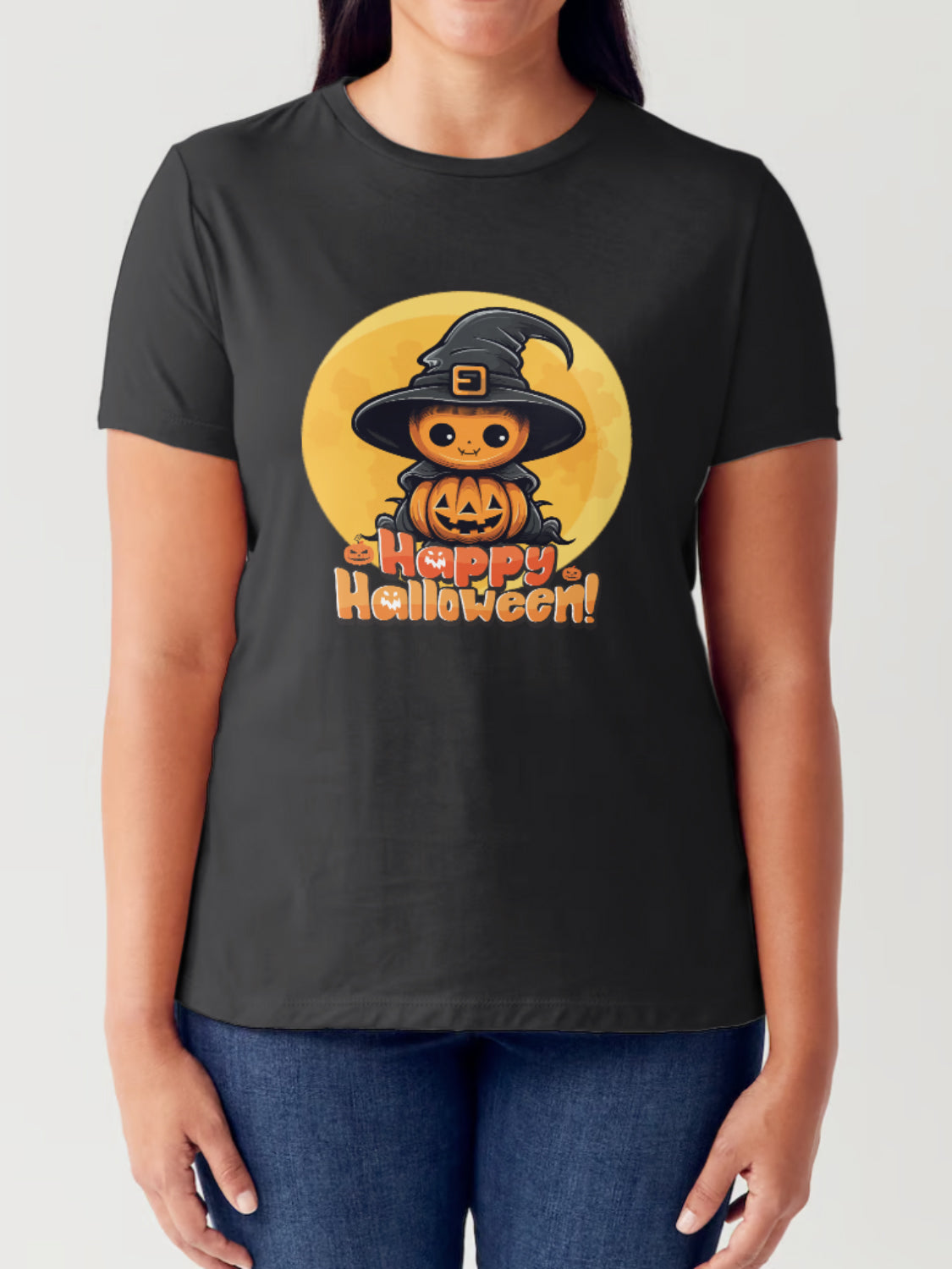 A person is wearing the Simply Love Full Size HAPPY HALLOWEEN Short Sleeve Tubular T-Shirt, made from 100% Ringspun Combed Cotton, showcasing a graphic of a black cat with a witch hat, a pumpkin, and the text "Happy Halloween!