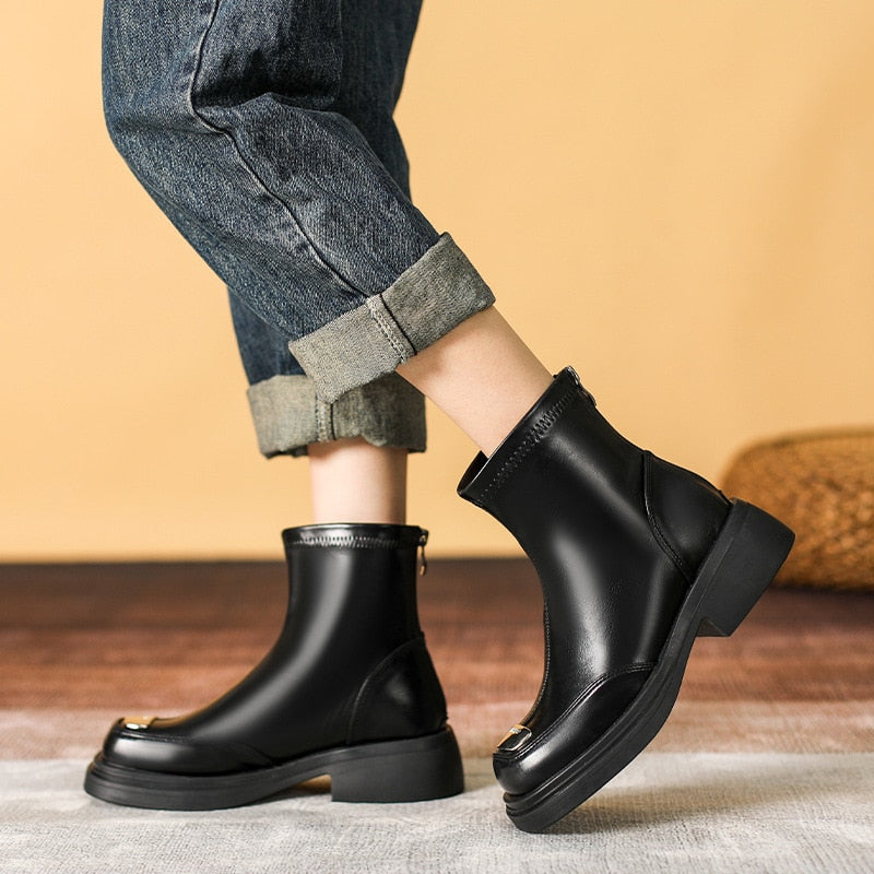 A pair of black and brown Brown Pu Leather Ankle Boots for Women Autumn Winter Short Plush with metallic accents, displayed on a woven surface.