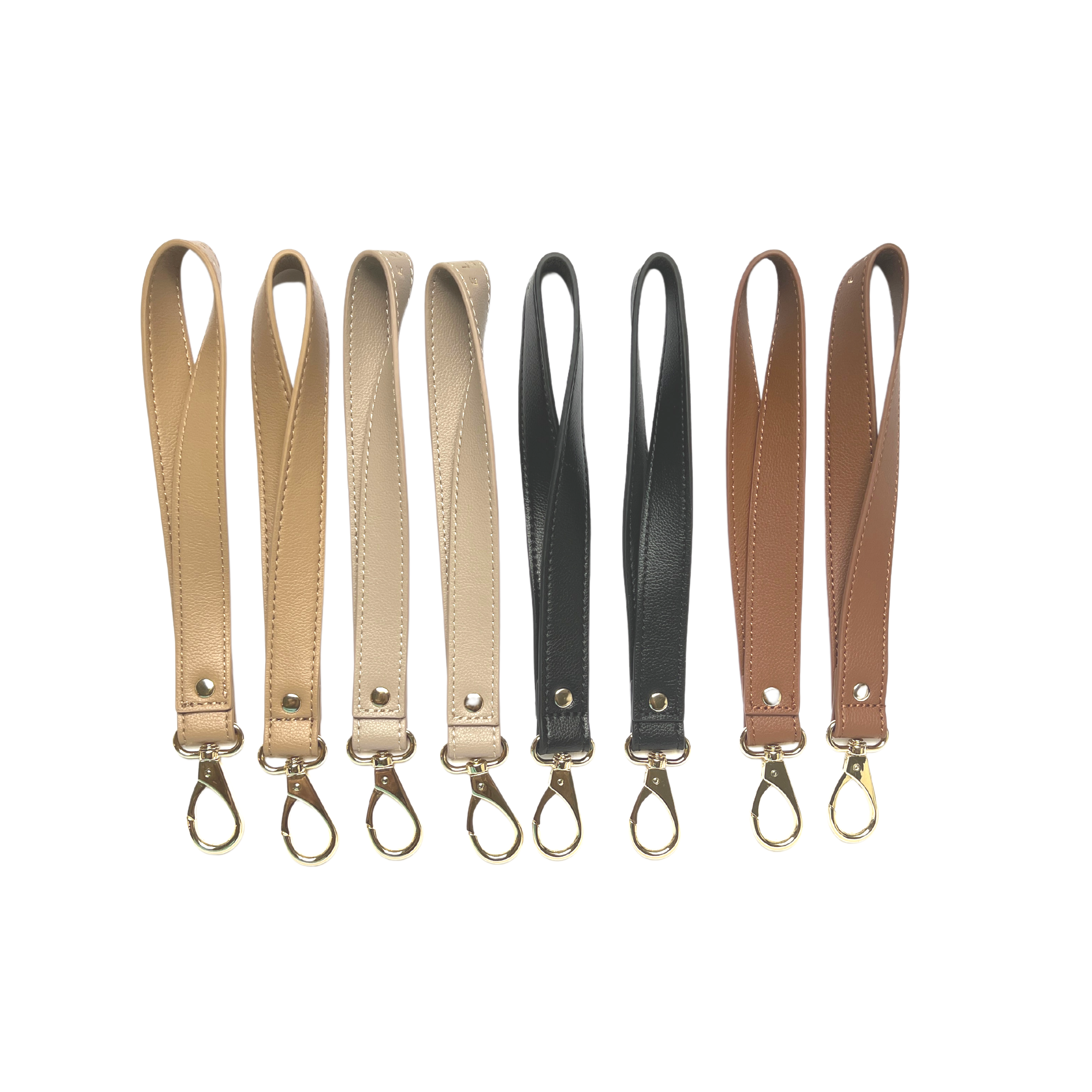 Eight high-quality Stroller Straps in various shades, including brown, beige, cream, and black, are displayed in a row with metal clasps at the bottom.