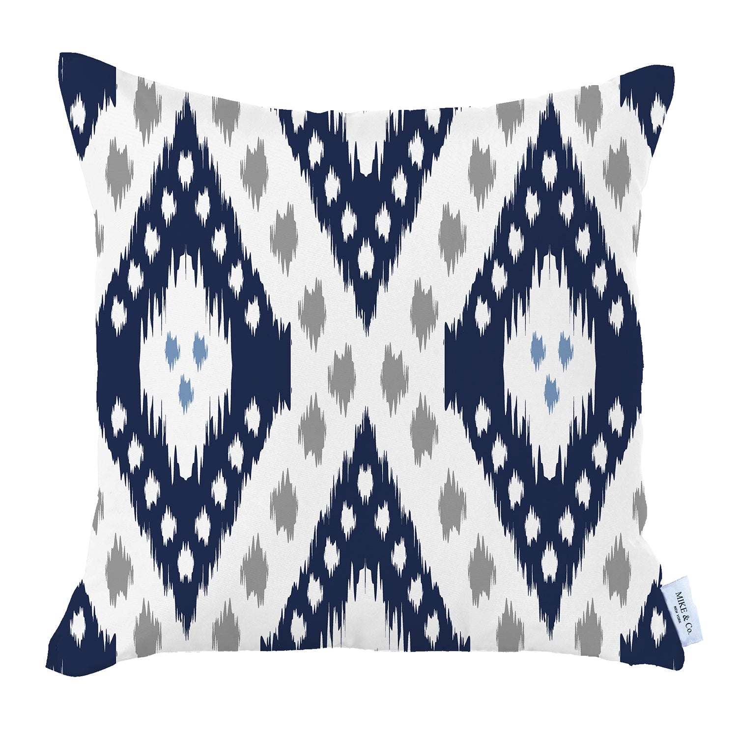 The brown sofa is adorned with the Ikat Set of 2 Square 18”x18” Boho Throw Pillow Covers, featuring a blue and white geometric pattern and hidden zipper closures for a seamless look. In the background, a plant peeks through, adding a touch of nature to the cozy space.