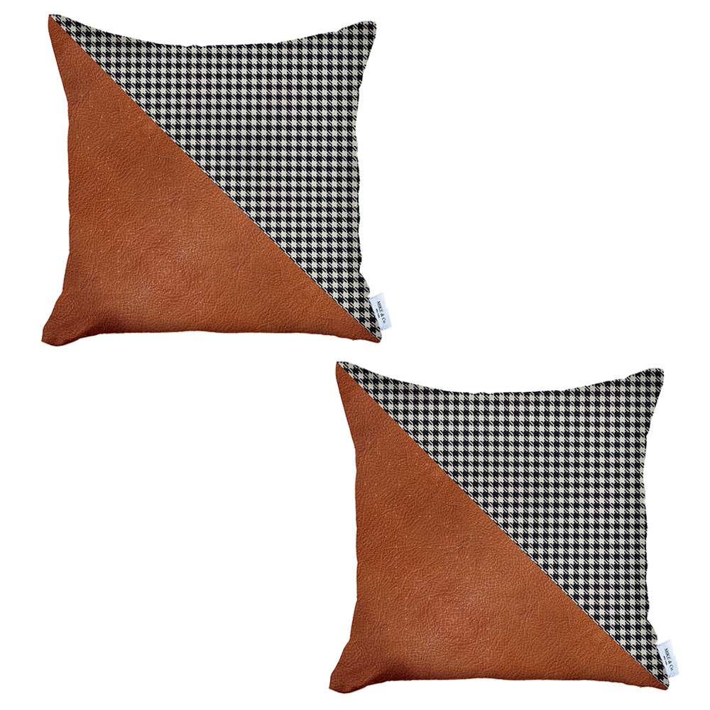 Two boho-chic 18" x 18" square throw pillow covers, handcrafted from vegan faux leather and featuring houndstooth patterns, adorn a brown couch. In the backdrop, a wooden ladder shelf holding a book enhances the cozy atmosphere with its harmonious blend of textures and eclectic design sensibilities.