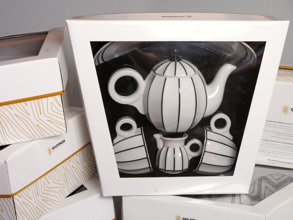 A Retro coffee/tea set by Pink Aether with a cup and saucer.