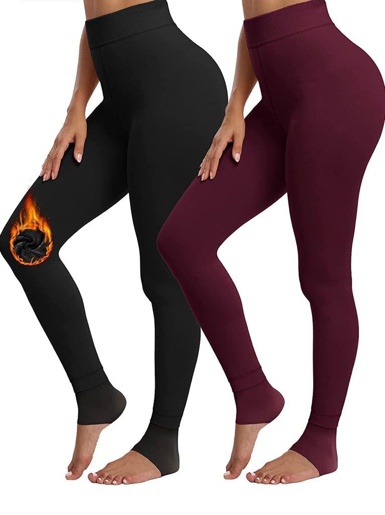 Two women wearing the 2 Pack Women’s Fleece Lined Leggings High Waist Stretchy Warm, one in black featuring a flaming design on the knee and the other in maroon. Both are shown from mid-thigh to feet, highlighting their stylish winter leggings that are perfect for cold days.