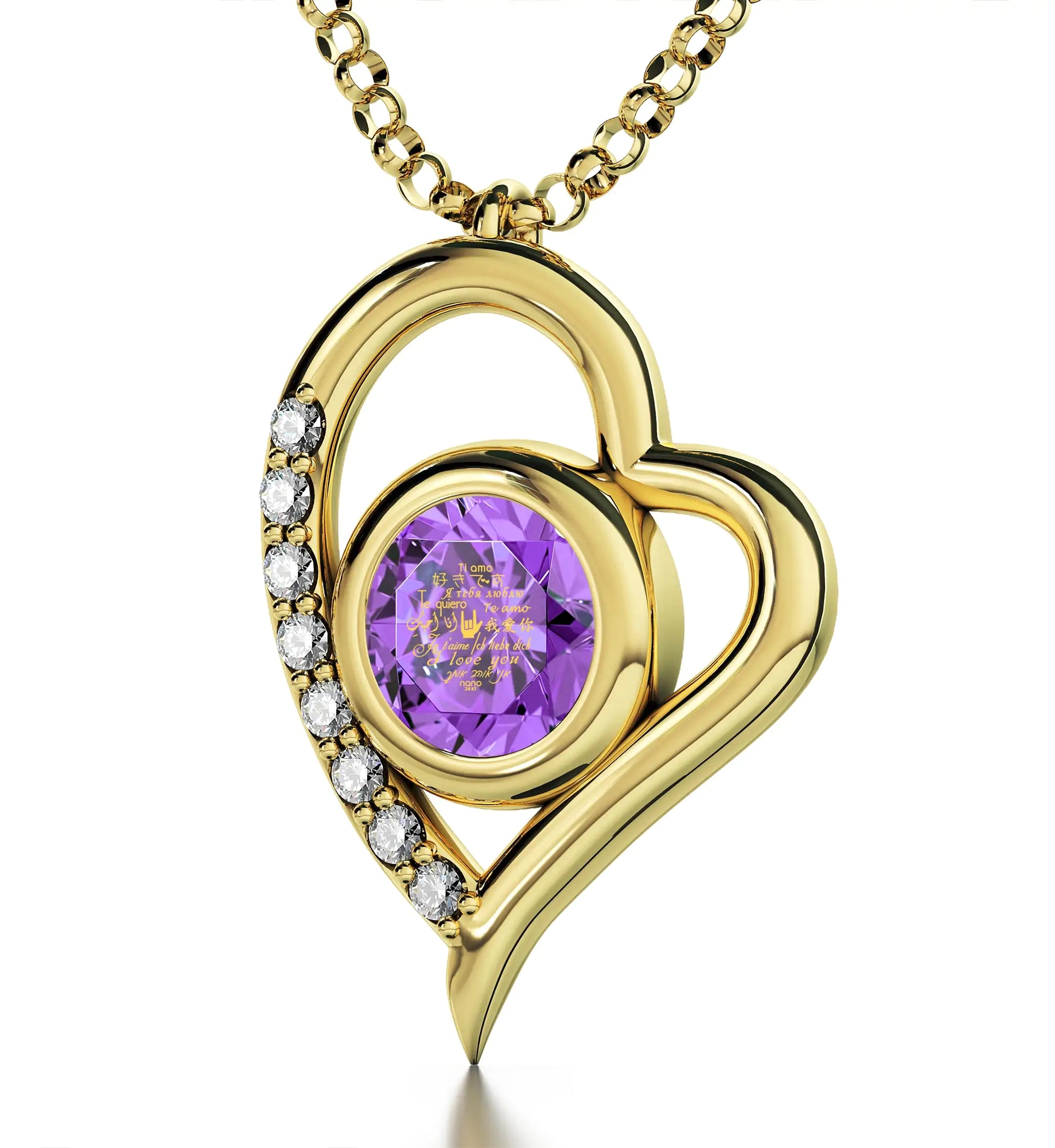Close-up of a purple gemstone set in a Gold Plated Silver I Love You Necklace Heart Pendant, engraved with "i love you" in multiple languages, perfect as an anniversary gift.