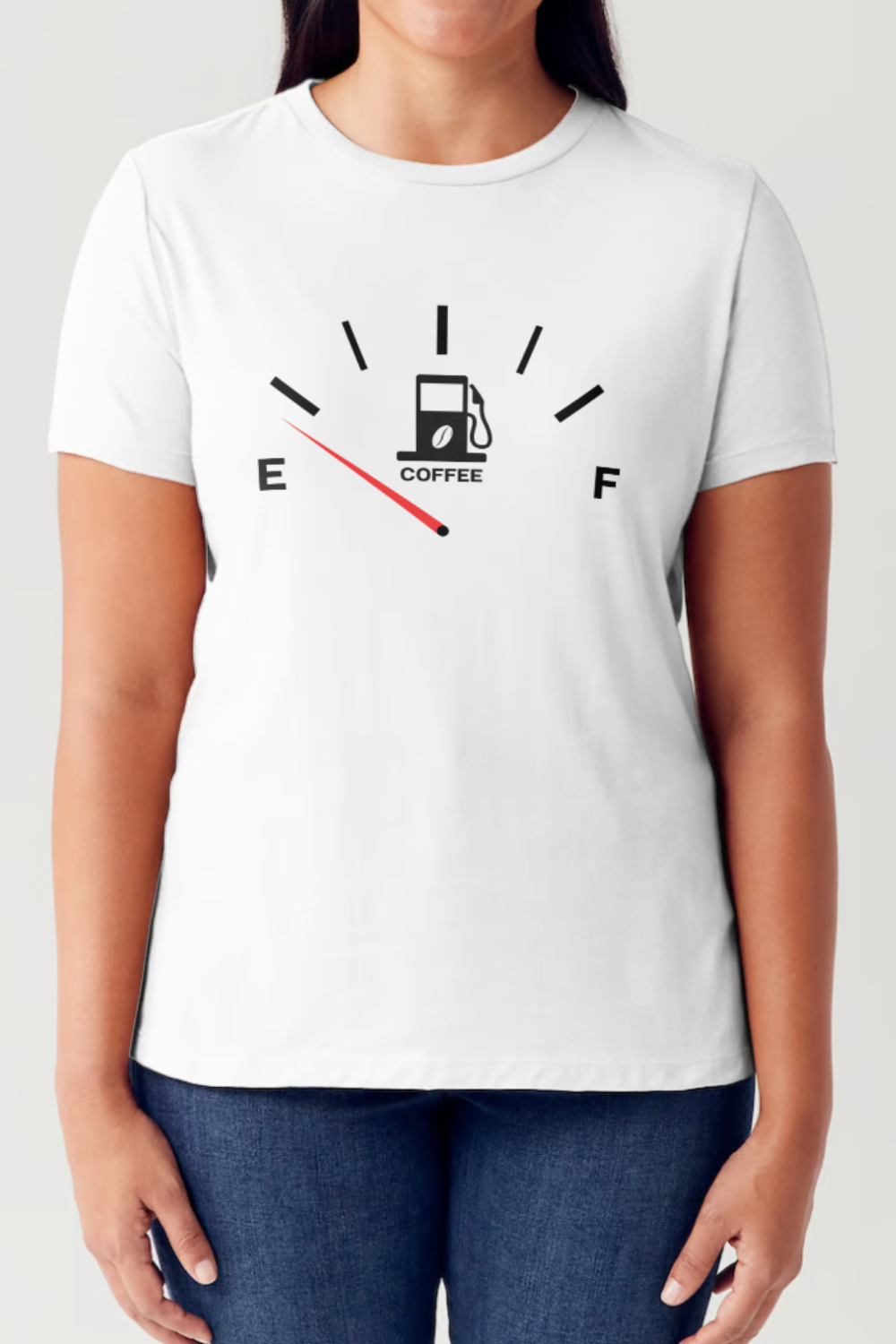 A coffee lover is wearing the Simply Love Full Size Coffee Fuelled Graphic Short Sleeve Tubular T-Shirt in black, which displays a fuel gauge with a coffee cup at the center and the needle pointing to 'E'. The 100% ringspun combed cotton material ensures comfort and style.